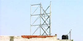 A mobile tower being erected atop a commercial complex in Moti Nagar locality in Ludhiana.