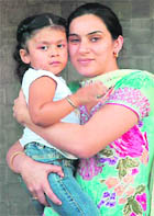 Two-year-old Jiya with her mother at Panchkula on Wednesday. 