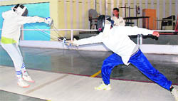 Fencers practice ahead of the National School Games at the skating rink in Sector 10, Chandigarh, on Wednesday.