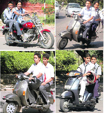 Young boys move around without helmet on theirtwo-wheelers in different parts of Chandigarh on Wednesday.