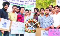 Students of the police administration department observe the Police Commemoration Day at PU on Wednesday.