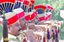 Delhi police personnel salute the martyrs who laid down their lives in the line of duty on the occasion of Police Commemoration Day Parade at New Police Lines in Delhi on Wednesday.