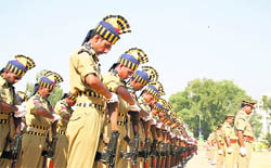  Policemen bow their heads in homage to the martyrs in Jammu on Wednesday