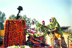 A member of a martyrs family lays 