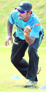 Indian captain Mahendra Singh Dhoni practices during a three-day training camp in Mumbai on Wednesday. India will play seven ODIs against Australia from Sunday. 