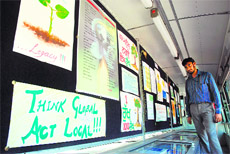 A visitor takes a look at the environmental messages at the exhibition