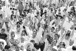 Supporters of INLD candidate Pradeep Chaudhary from Kalka celebrate his victory at Sector 14 in Panchkula on Thursday.