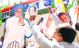 Congress workers celebrate the partys victory in assembly polls in three states, in Mumbai.