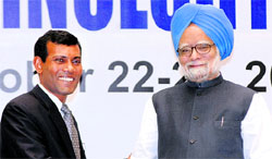 Prime Minister Manmohan Singh with Maldives President Mohamed Nasheed in New Delhi on Thursday.