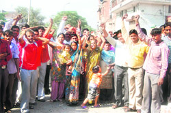 Residents protesting against the demolition of an unauthorised structure in Kirpal Nagar in Ludhiana