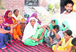 Grieving family members, (inset) Satpal