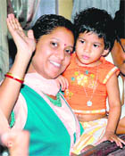 Atindra Nath Dutta's wife Indranni Dutta, along with her daughter, at their Kolkata residence on Thursday after her husband was released by Maoists at Lalgarh in West Midnapore district. 