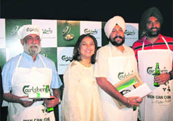 Karen Anand with the winners of the show, Men Can Cook
