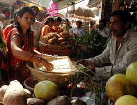 Devotees make purchases for Chhat Puja at Sadar Bazar in Gurgaon on Friday.