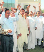 Vikram owners protest in front of the State Transport Authority office in Dehradun on Friday.