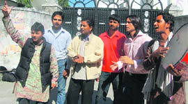 Volunteers of Prayas Jagrookta manch stage a street play to highlight the demand of Right to Education in Dehradun on Friday.