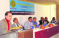 Kullu deputy commissioner BM Nanta speaking at a workshop on trout fish at Manali on Friday.