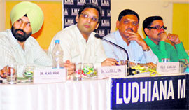 L to R: SSP SS Gill, DC Vikas Garg, LMA president VK Goyal and DIG SS Chauhan at the LMA meeting on civic development in Ludhiana on Friday.