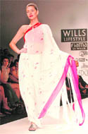 A model displays a creation by designer Wendell Rodricks during the Wills India Fashion Week Spring Summer 2010 in New Delhi on Saturday.