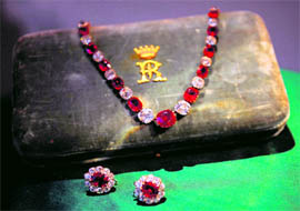 A ruby necklace and earrings of the Duchess of Roxburghe are displayed at Sotheby's auction house in London.