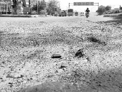 Potholes on the Chandigarh-Ambala highway near the Zirakpur flyover.