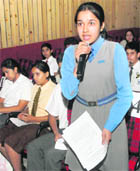 A student takes part in an inter-school debate at Vivek High School, Sector 38, Chandigarh, on Saturday.