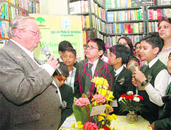 Ruskin Bond interacts with schoolchildren at a book launch function at Natraj Publishers in Dehradun 