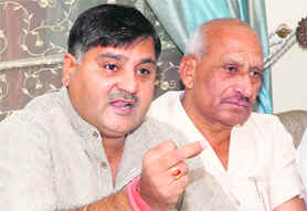 BJP leader Chander Prakash Kathuria addresses mediapersons in Karnal on Saturday.