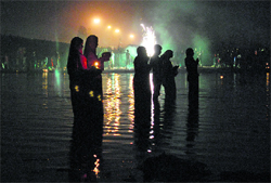 Residents perform Chhath Pooja in the Sutlej in Ludhiana