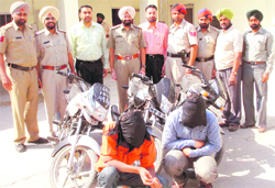 The two accused along with the three stolen motor cycles in police custody at Mullanpur Dakha