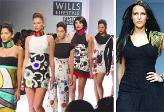 Models present creations of Poonam Bhagat. (Right) Neha Dupia walks for Kavita Bhartia during the Wills Fashion Week in New Delhi on Sunday. Tribune photos: Manas Ranjan Bhui