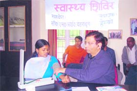A patient being checked at a health camp in Dehradun