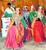 Girls presenting traditional dance in Gaddi costumes at the annual function of CATS at Dharamsala on Sunday.