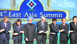 Prime Minister Manmohan Singh poses with premiers of nations taking part in the East Asia Summit (EAS) in Thailand on Sunday.
