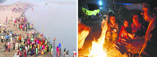 Devotees offer prayers to the Sun during the Chhat puja in Ludhiana on Sunday and (R) a family sits near bonfire to beat the chill