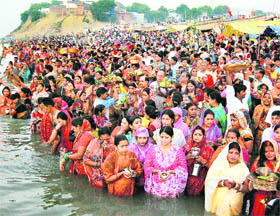 Women worship the Sun god on the occasion of Chhath Puja in Allahabad 