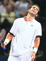 Pete Sampras reacts during an exhibition tennis match against in Macau on Sunday. 