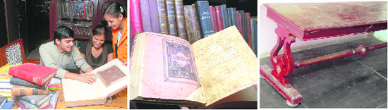 Students in the AC Joshi Library read an old book of historic value and; (right) a 100-year-old table, which was brought from Panjab University, Lahore, after Independence.