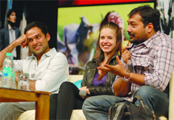 Director Anurag Kashyap with actors Abhay Deol and Kalki Koechlin interacts on the first day of the Osian Cinefan Film Festival at Siri Fort Auditorium in New Delhi 