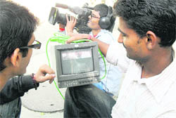 Members of the National Film Development Corporation shoot a documentary