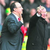Liverpools manager Rafa Benitez (L) and his Manchester United counterpart Alex Ferguson during their EPL match at Anfield in Liverpool on Sunday.