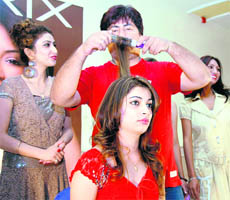 A model gets a hairdo at a Matrix workship in Dehradun.