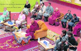 The Dalai Lama attending a function organised in his honour by other Nobel laureates at Dharamsala