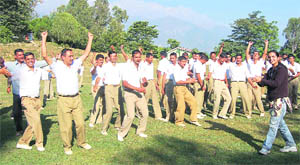 Police personnel attend a yoga camp in Dharamsala. 