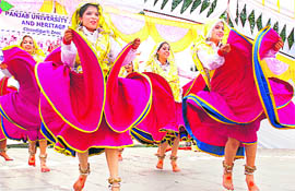 Girls perform a group dance during the Youth and Heritage Festival at GGDSD College, Sector 32, Chandigarh, on Wednesday. 