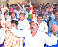 Workers during the National Protest Day at Bhakna Bhawan, Sector 29, Chandigarh, on Wednesday.