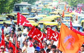 Left party activists protest against the Delhi government for hiking DTC bus fare in New Delhi on Wednesday. Tribune photo: Manas Ranjan Bhui
