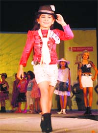 A girl walks the ramp during kids fashion show at The British School in Chandigarh