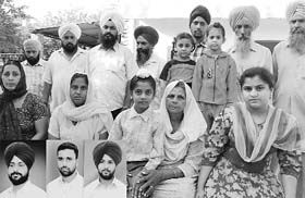 Family members of the three brother (inset) who were murdered at Takipur village, Kurali, in 2006