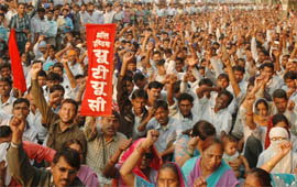 Labourers hold a dharna at RICO Industries in Gurgaon on Wednesday.